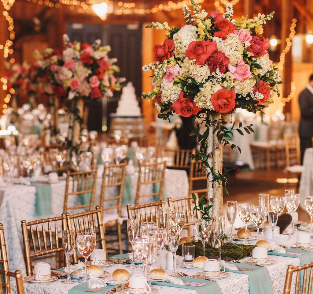 yellow-light-garlands-hang-dinner-tables-decorated-min